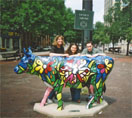 Jean Jean, Mandy and Scott accost a cow as it saunters innocently through the streets of Manhattan. ;)
