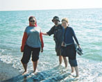 AJ, James and Aderyn wade around in a big-ass lake. 